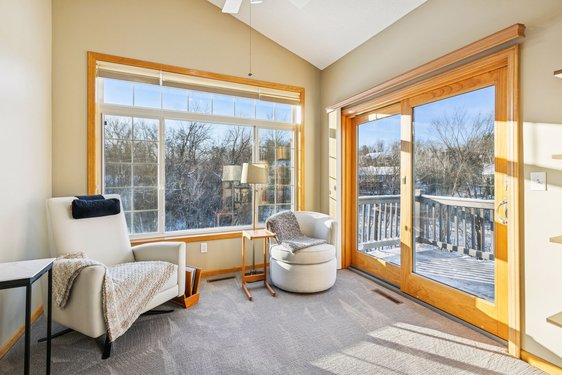 Sunroom with large window views